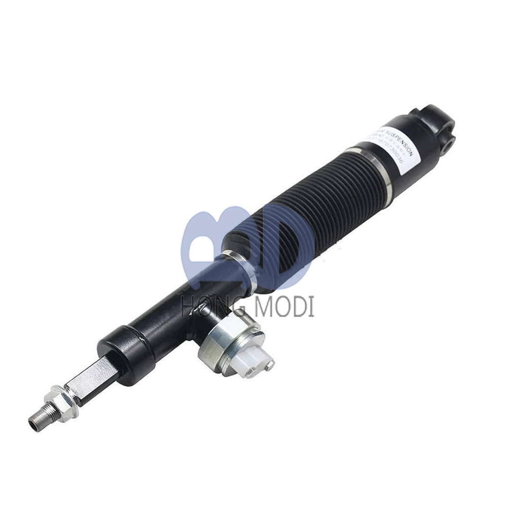 Left rear hydraulic shock absorber (with HBMC) for Nissan Patrol VI Y62 AWD 2010-2023, part numbers: E6211-6JF9A, E6211-1LB9B